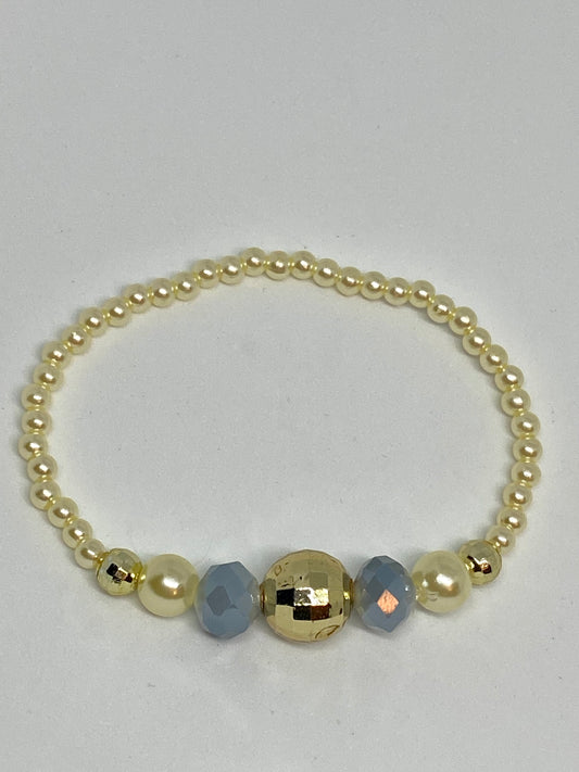 beaded flexible bracelet gold color and blue