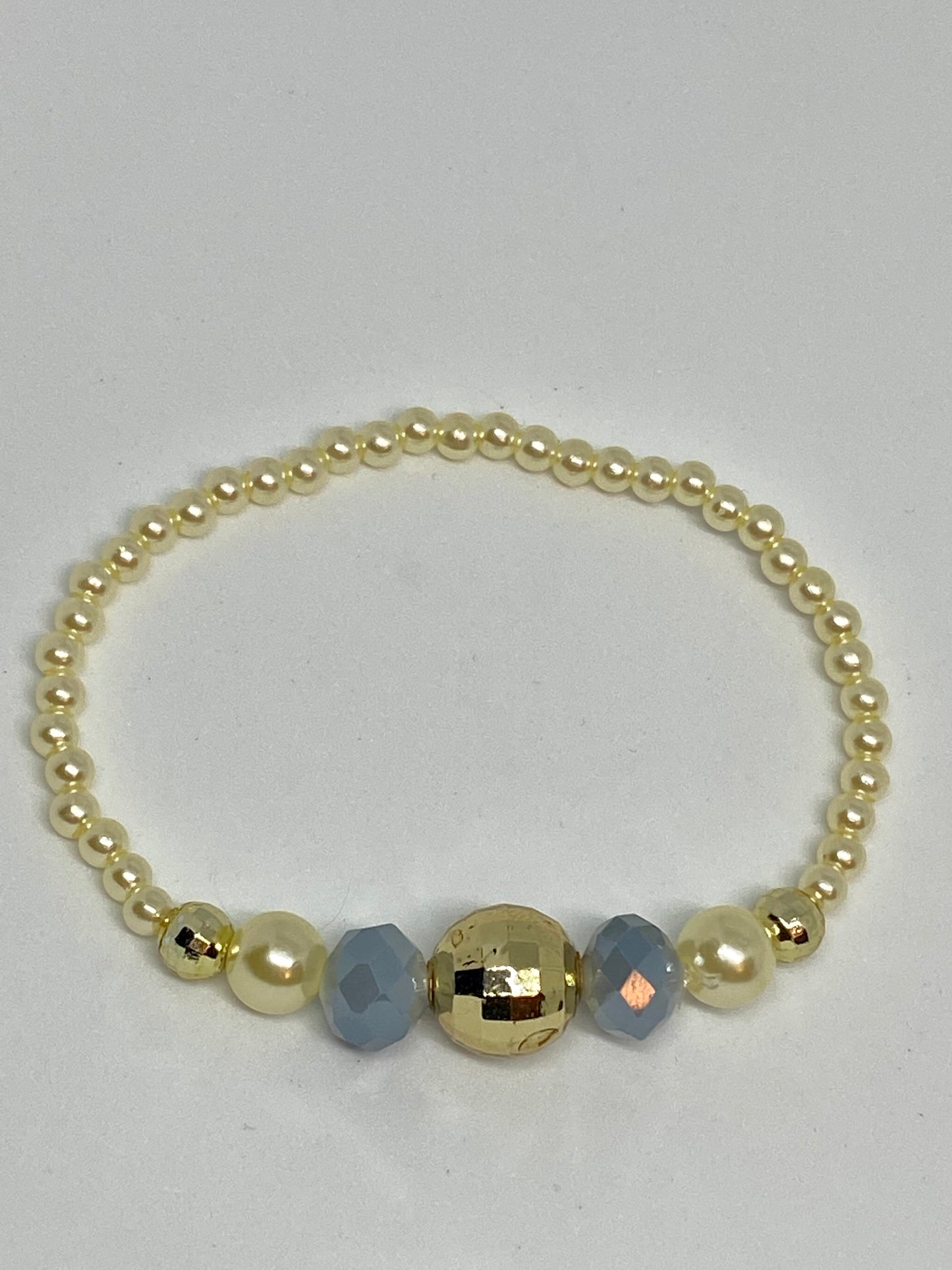 beaded flexible bracelet gold color and blue