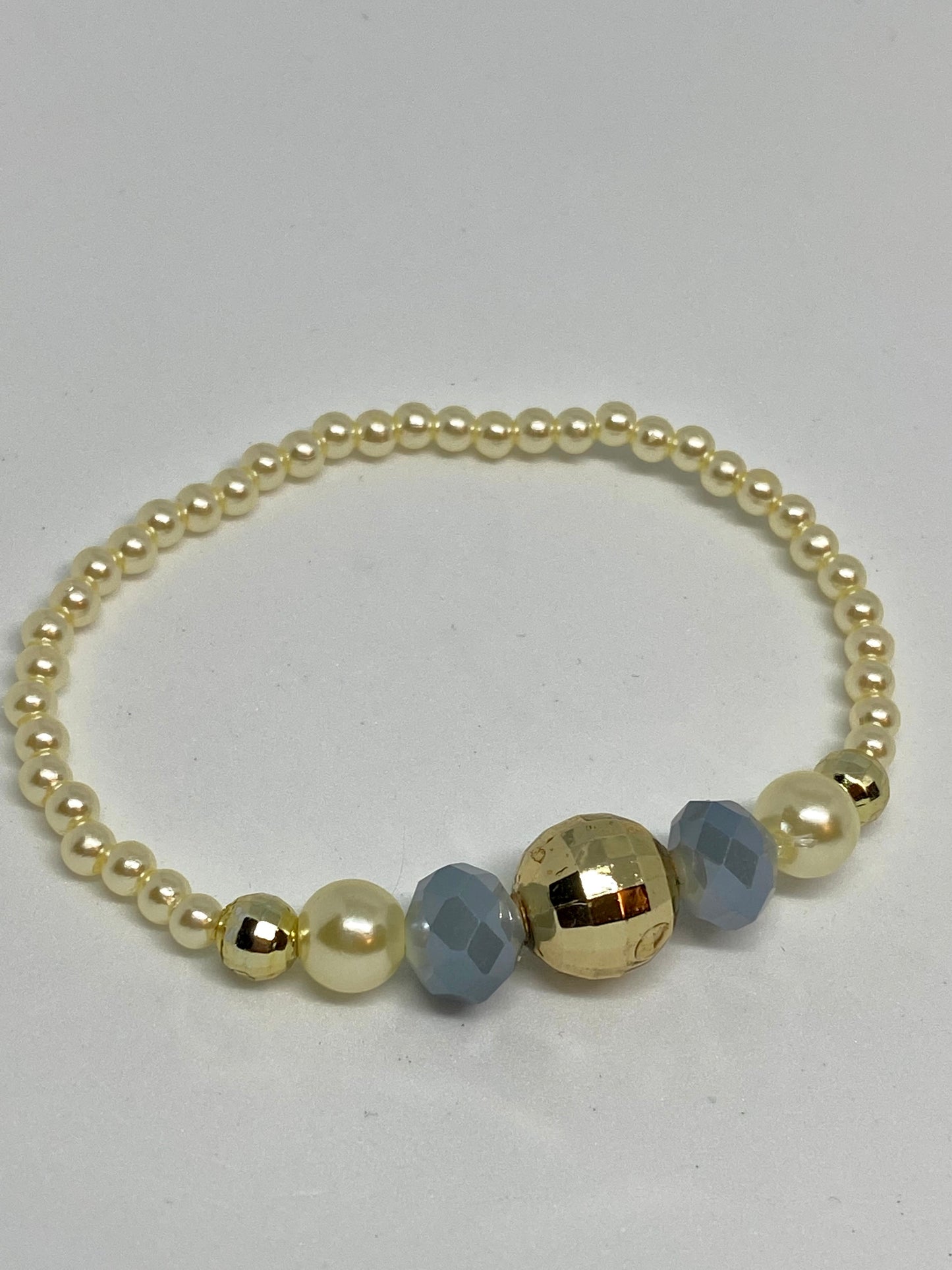 beaded flexible bracelet gold color and blue